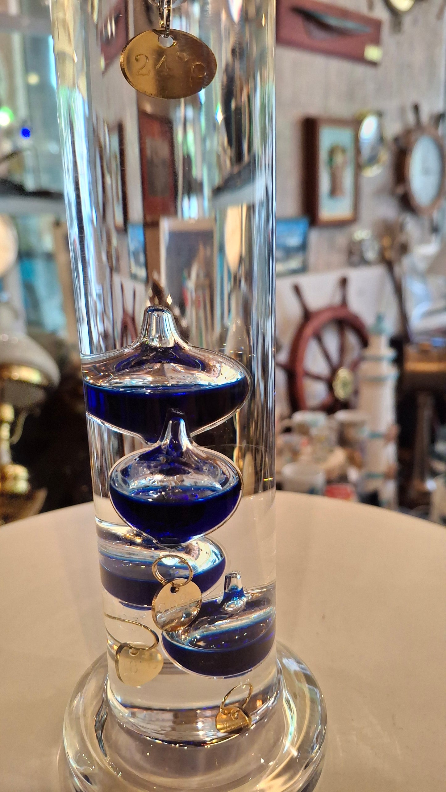 Termometro galileo con ampolle blu