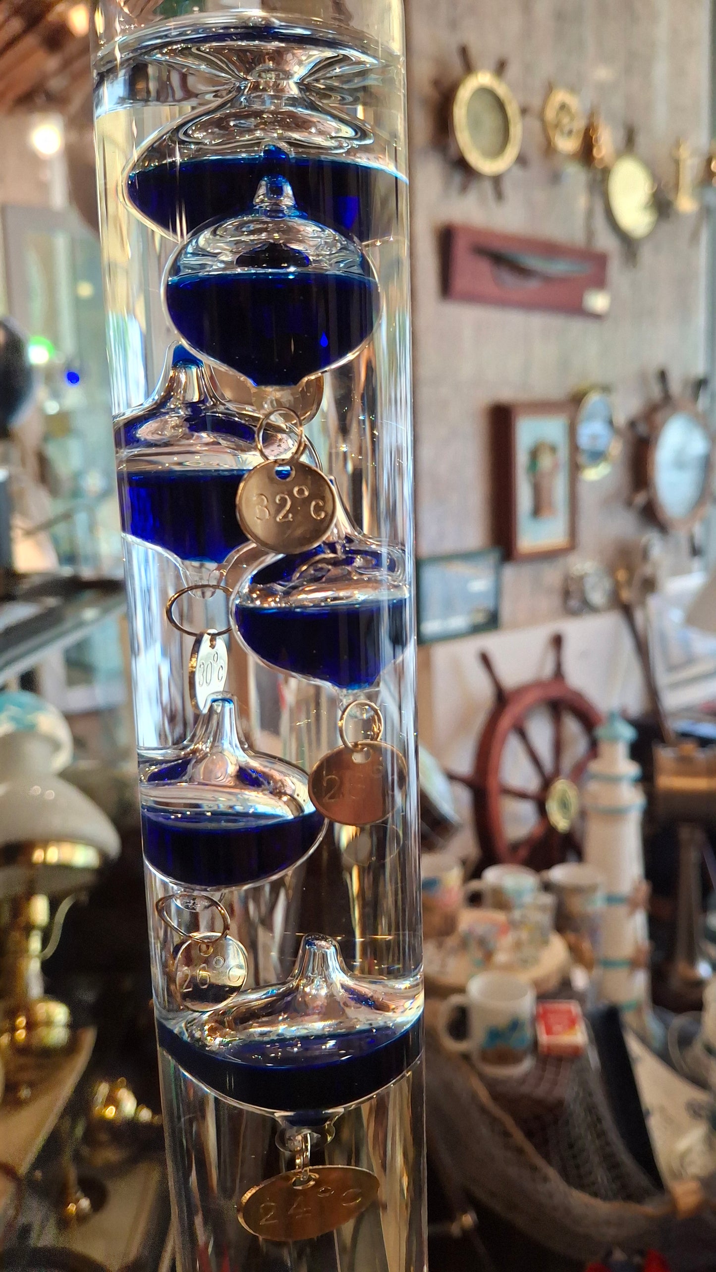 Termometro galileo con ampolle blu